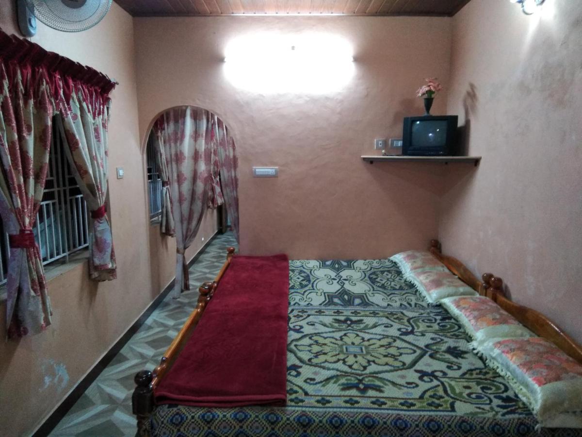Maniis Homestay Vālpārai Buitenkant foto